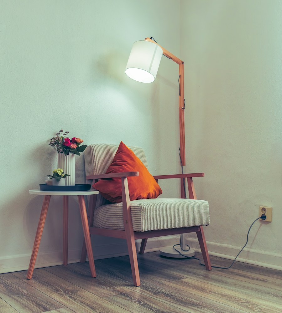 Cozy reading corner with an armchair and wall clock