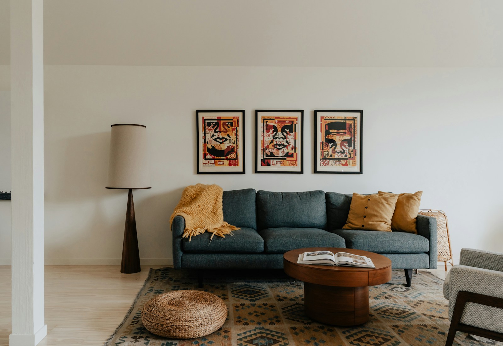 Living room with a statement artwork hung above the sofa