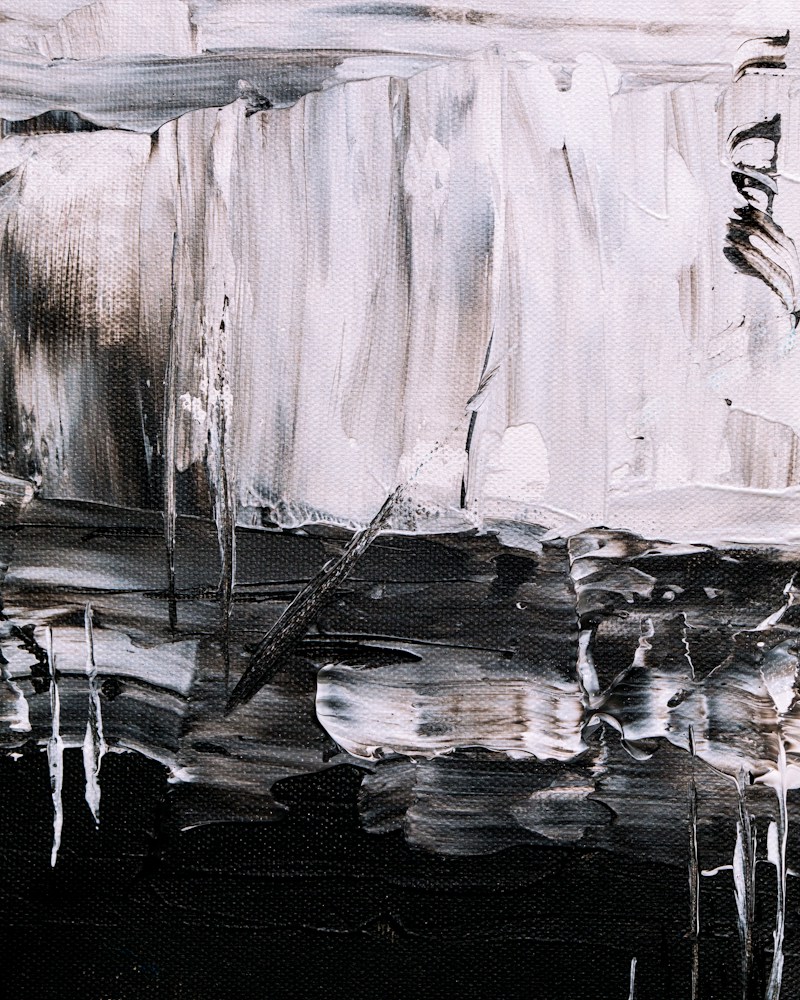 Textured canvas with sweeping black and white abstract marks